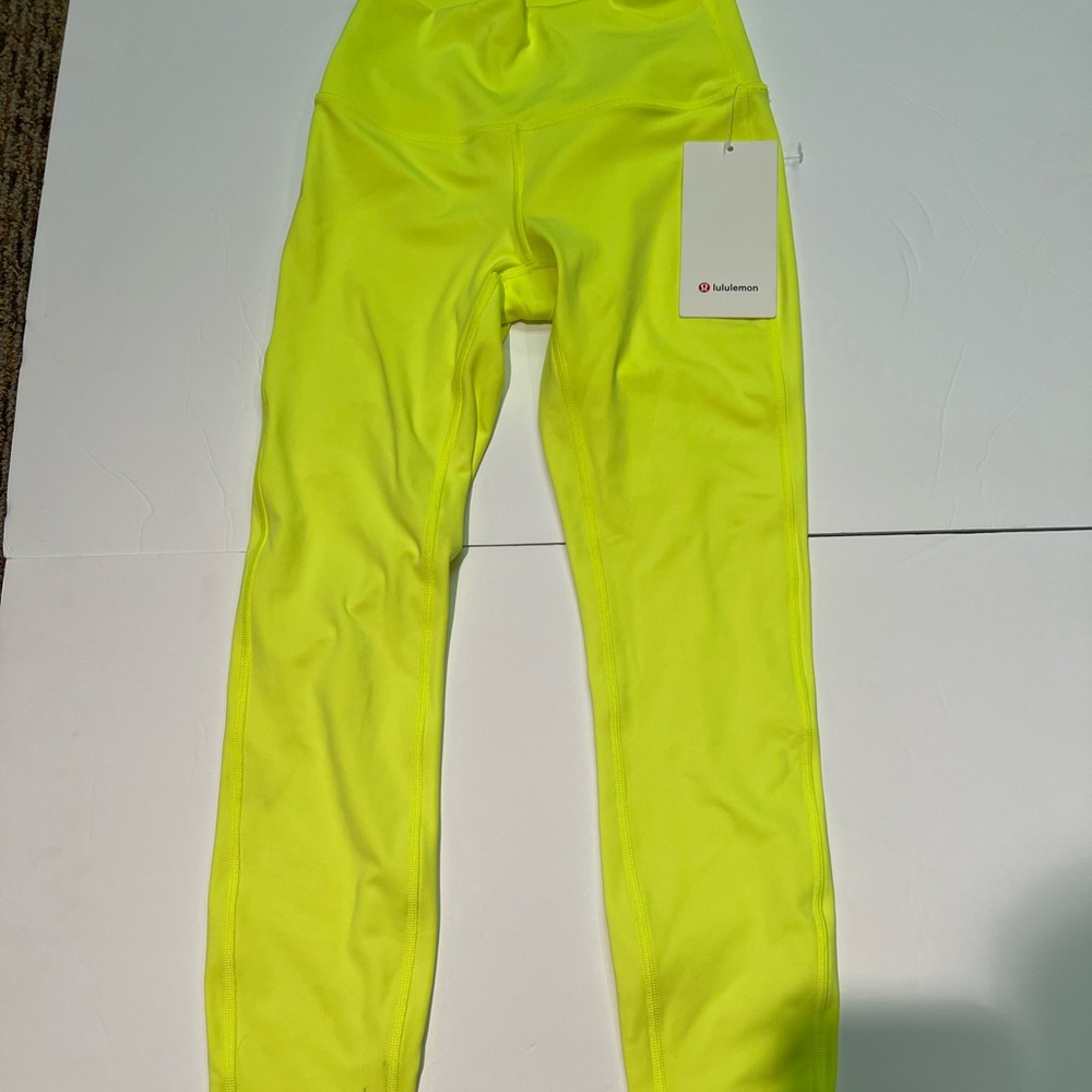 New with tags lululemon, yellow leggings.